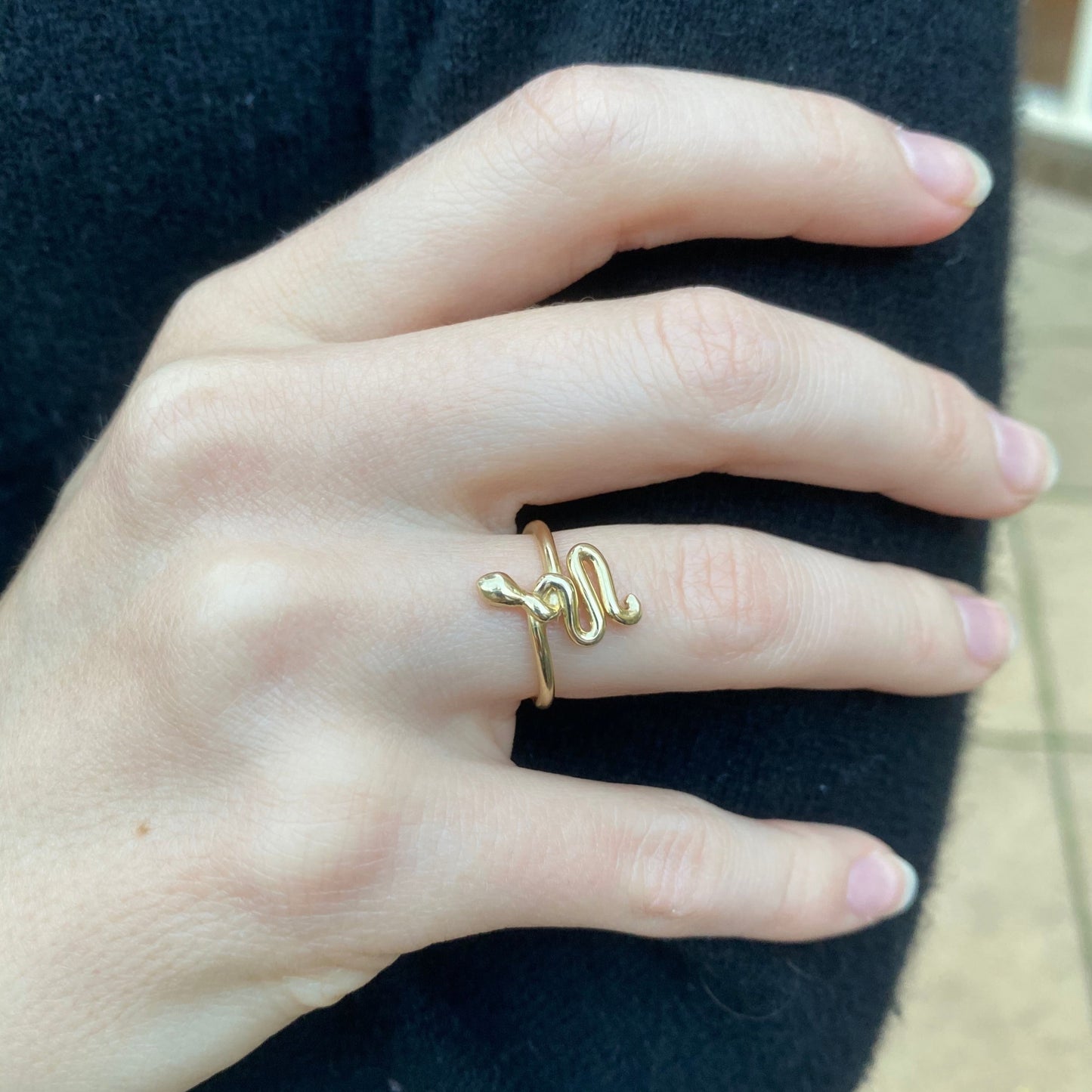 9ct gold snake ring on model