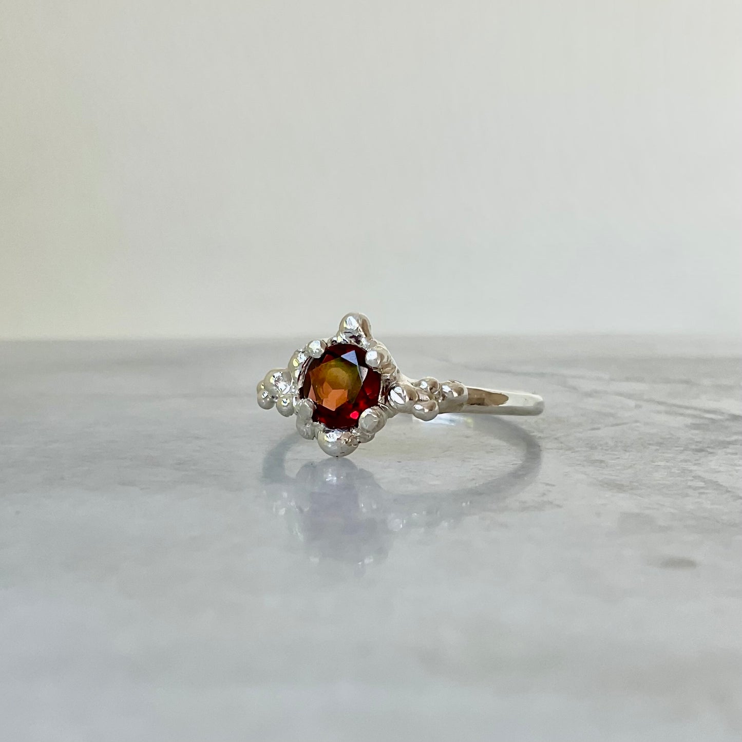 Garnet ring side view