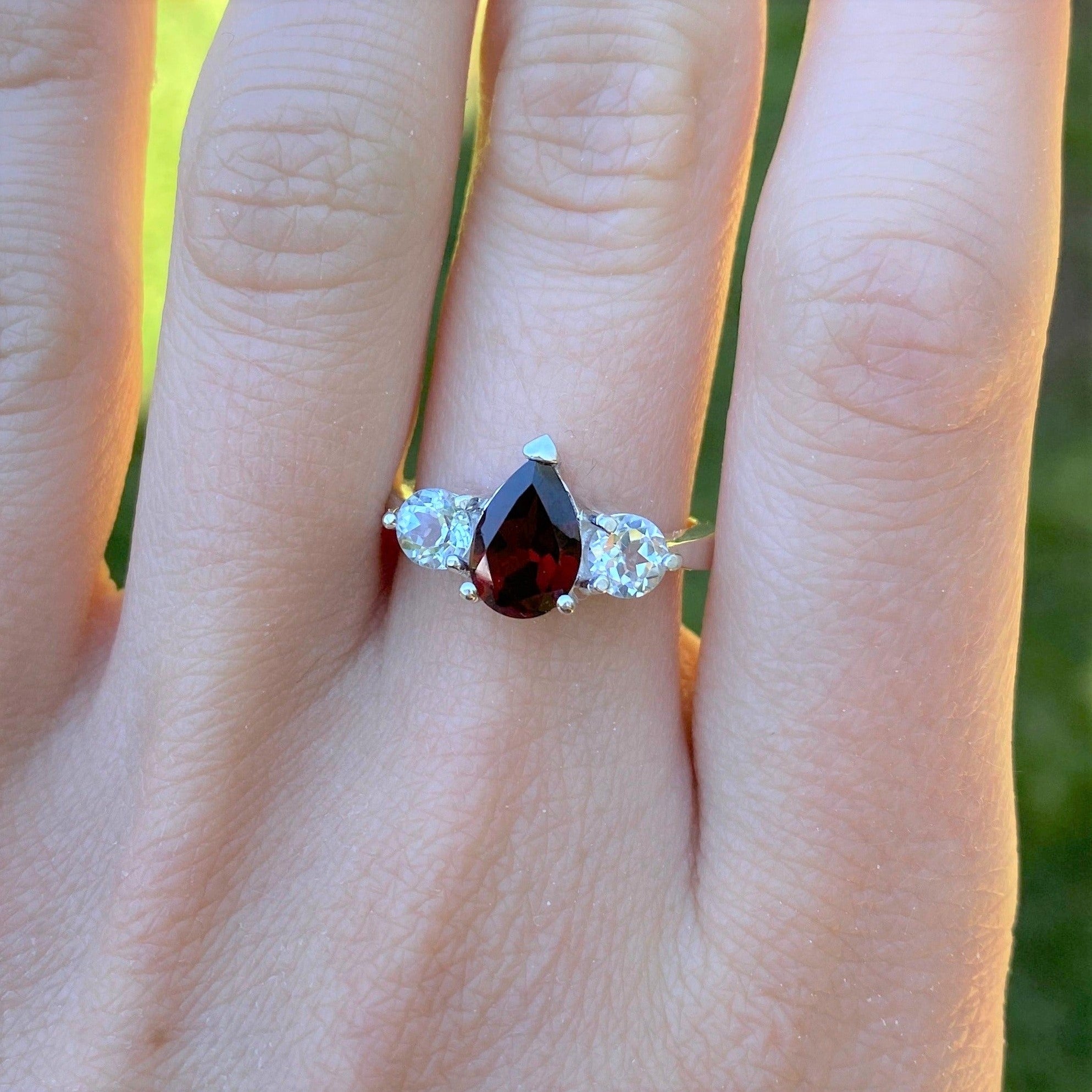 Garnet ring on hand