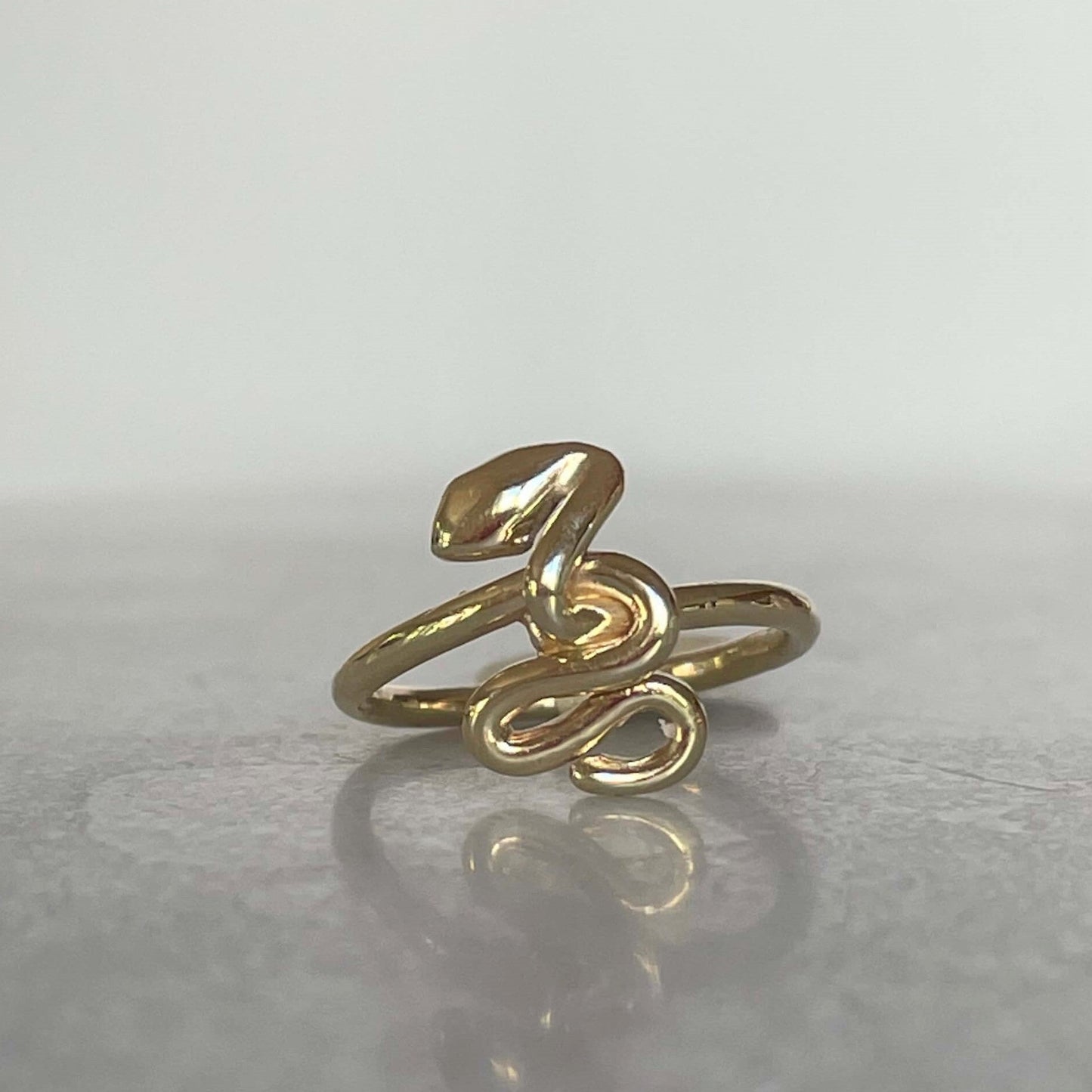 Gold serpent pinky ring