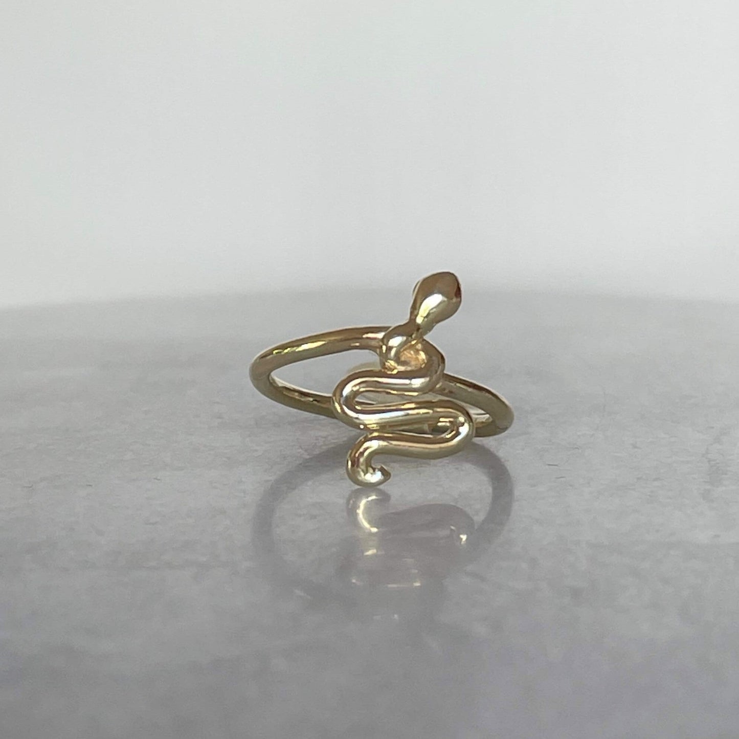 Gold serpent ring