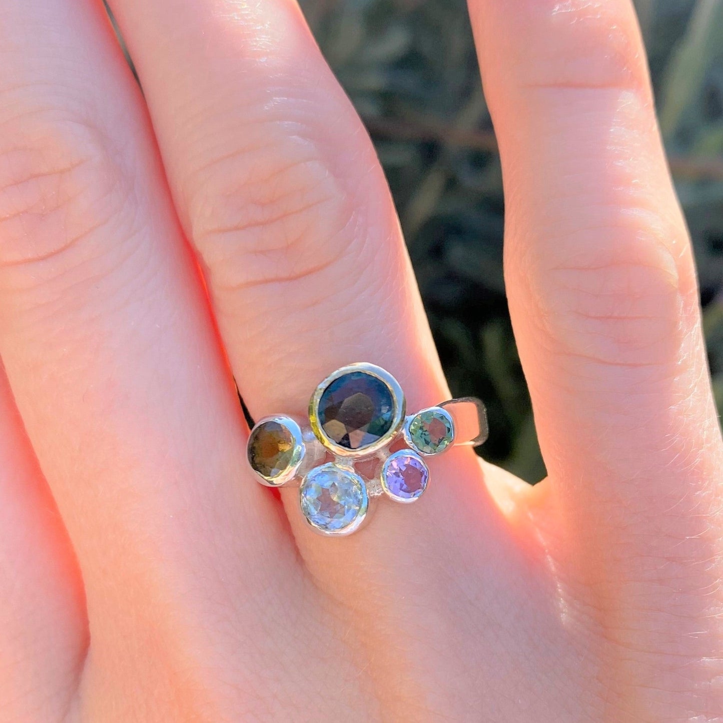 green tourmaline cluster ring on model