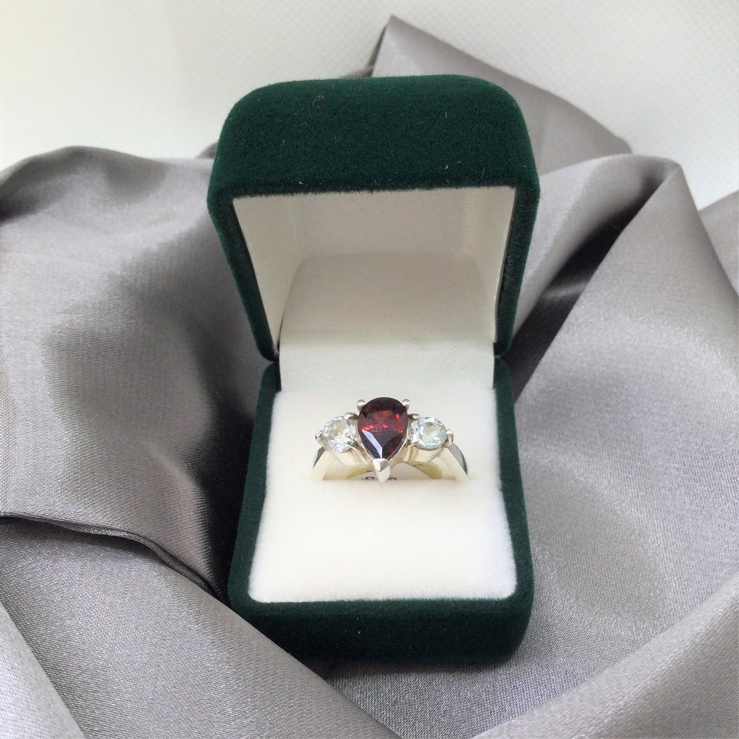 Garnet cluster ring in box