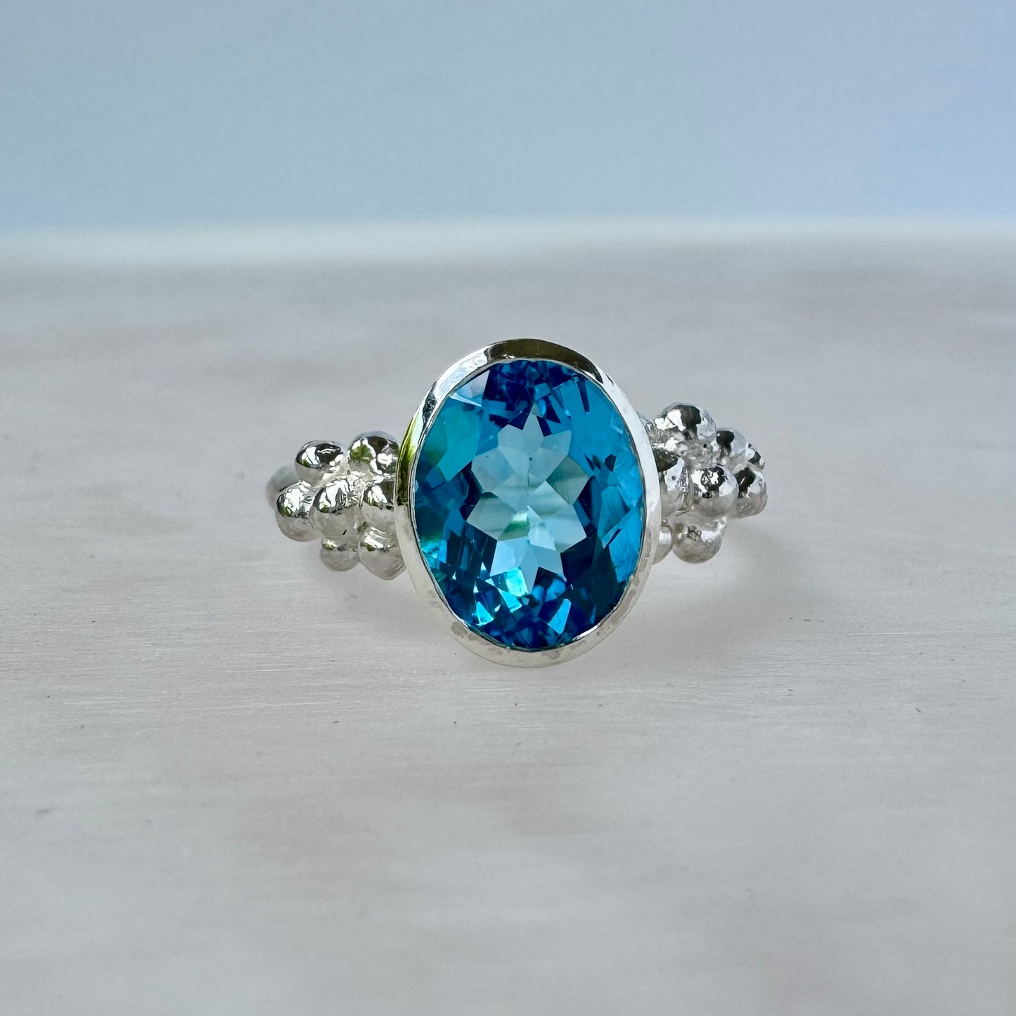 Thira Ring | Swiss blue topaz Size M1/2