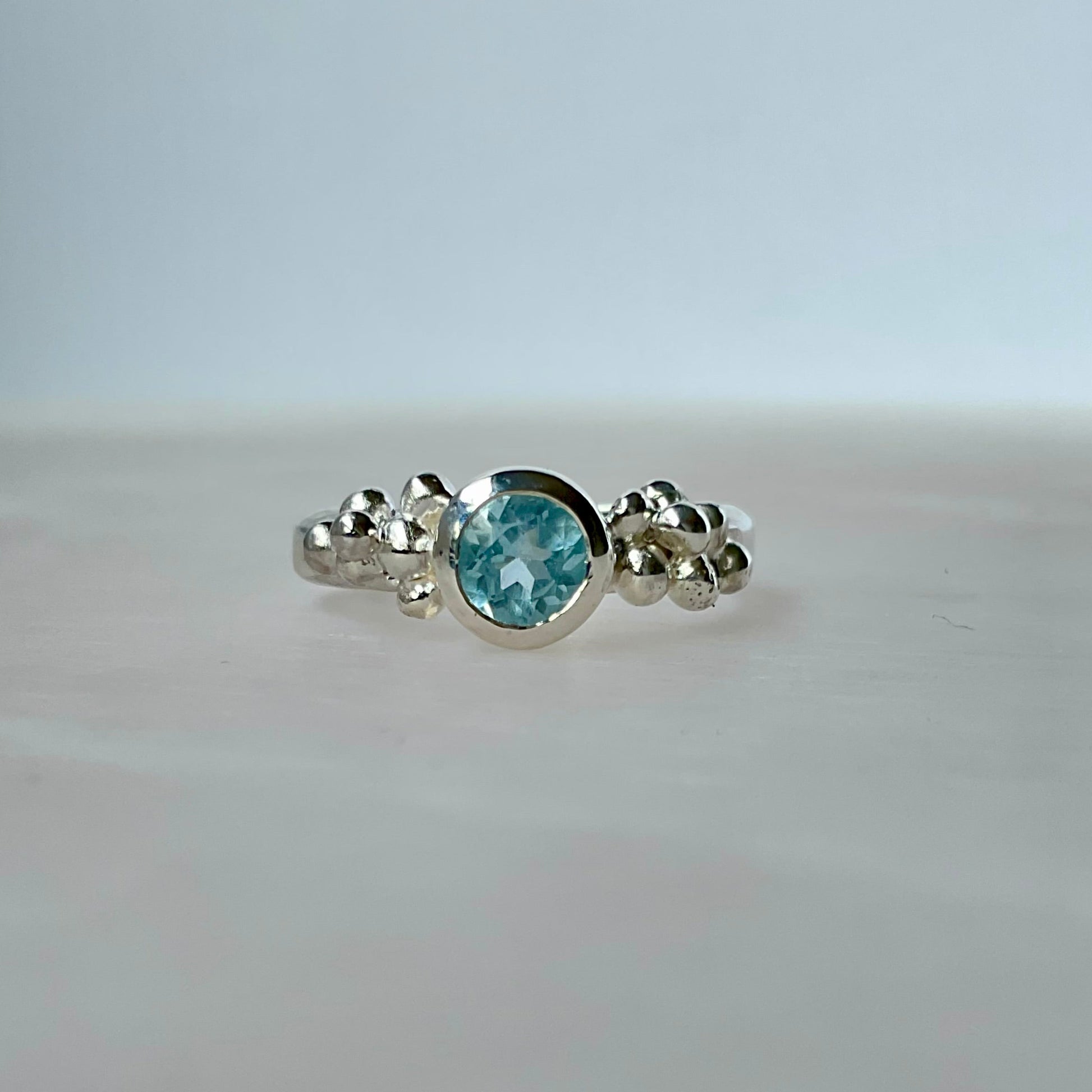 Sky blue topaz silver bubble ring