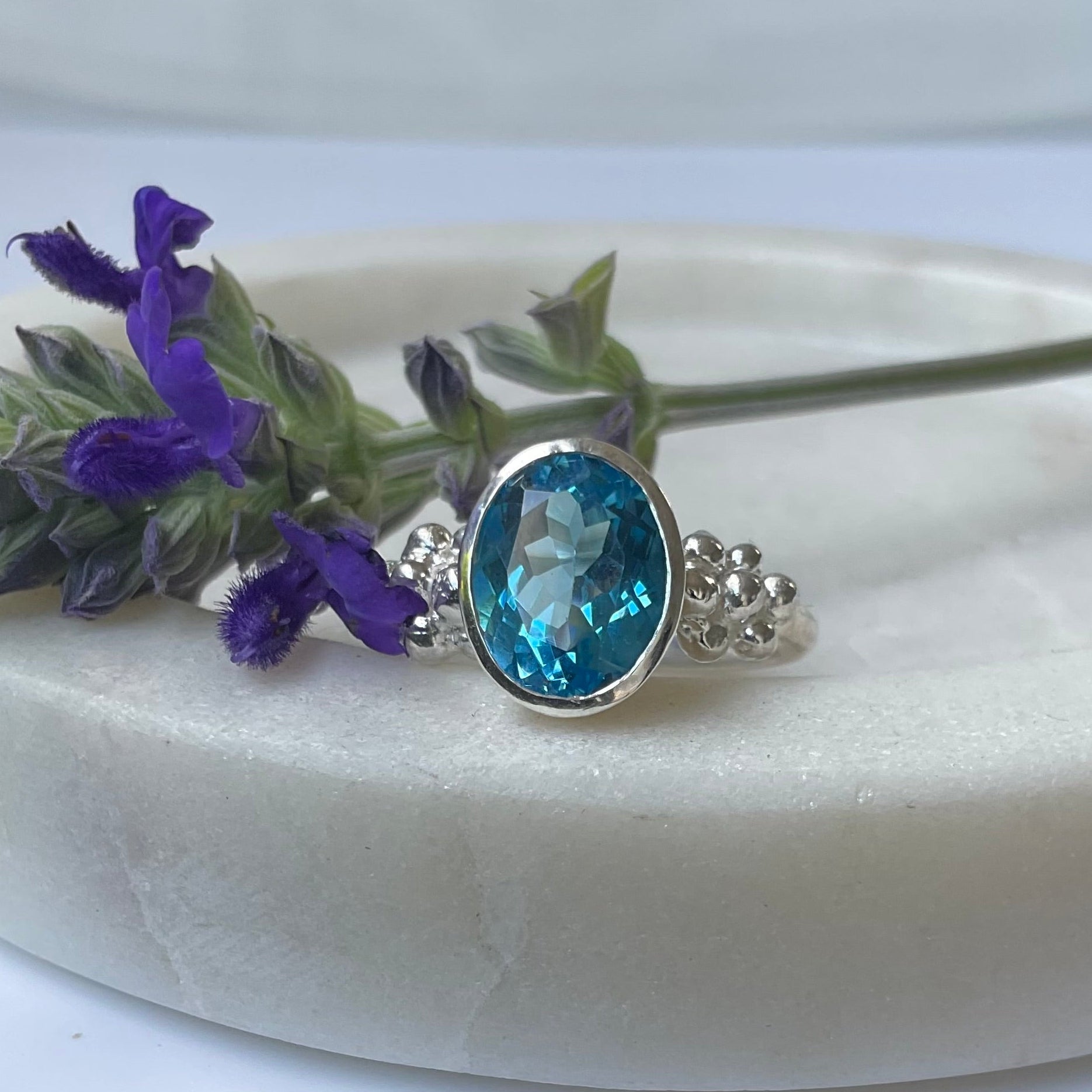 Sterling silver ring with blue topaz
