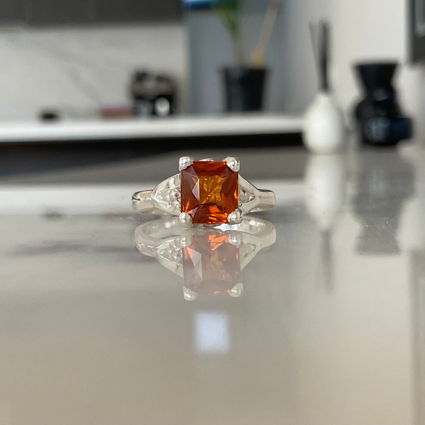 Rectangular orange garnet solitaire ring in sterling silver