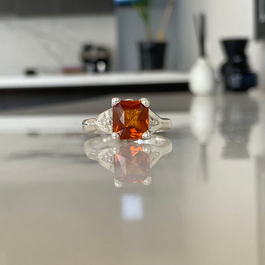 Rectangular orange garnet solitaire ring in sterling silver
