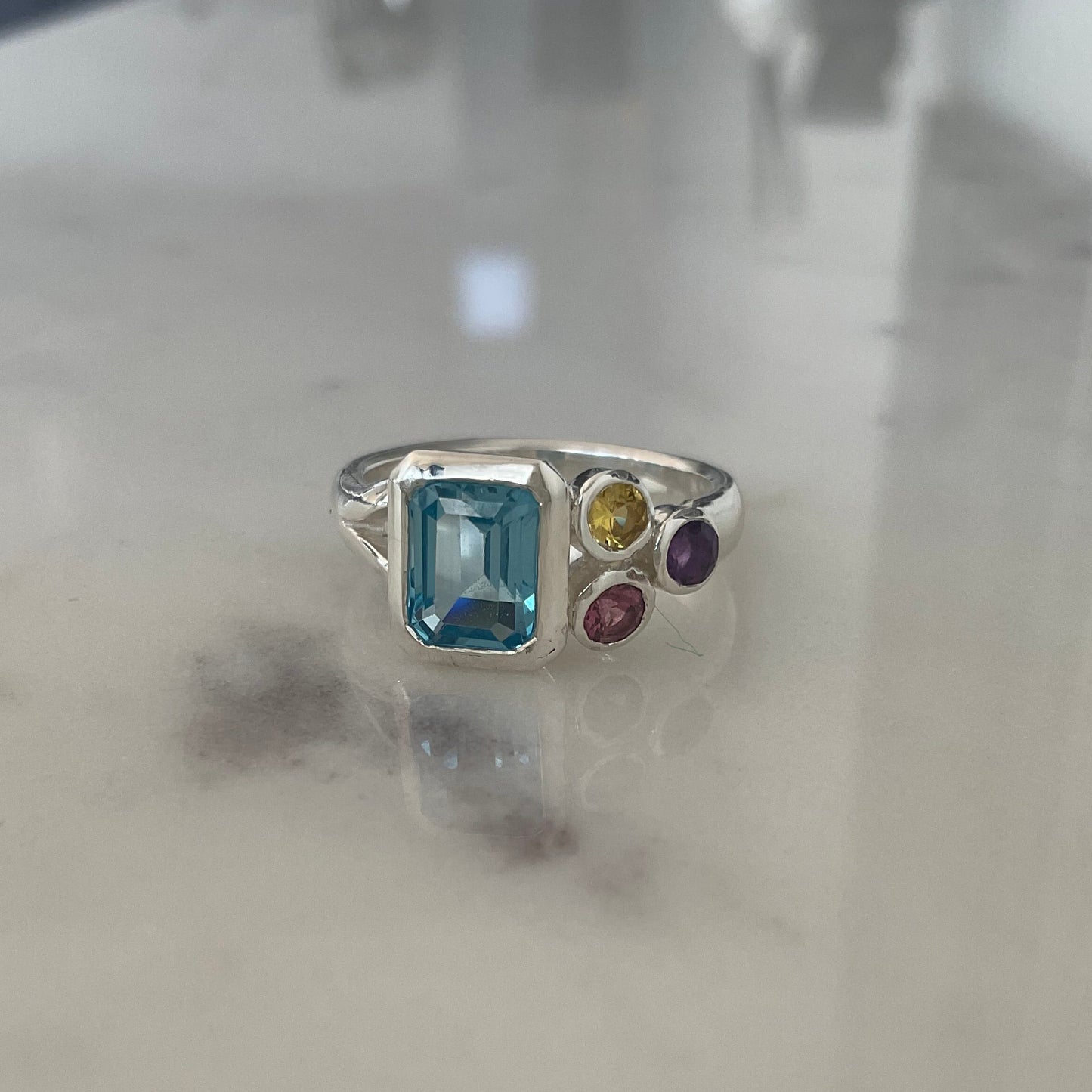 Blue topaz cluster ring