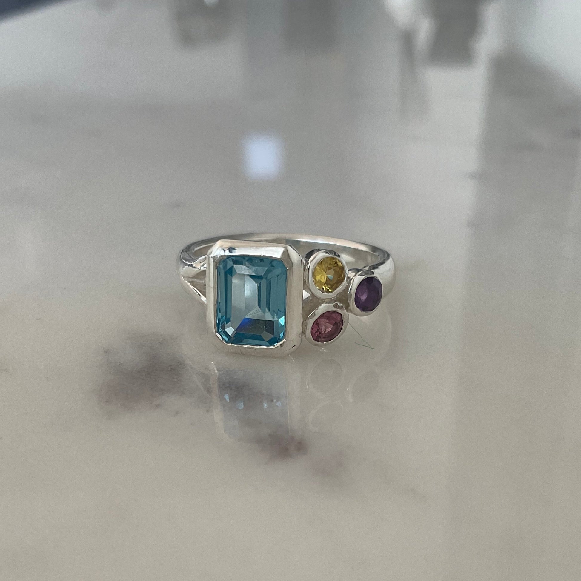 Blue topaz cluster ring