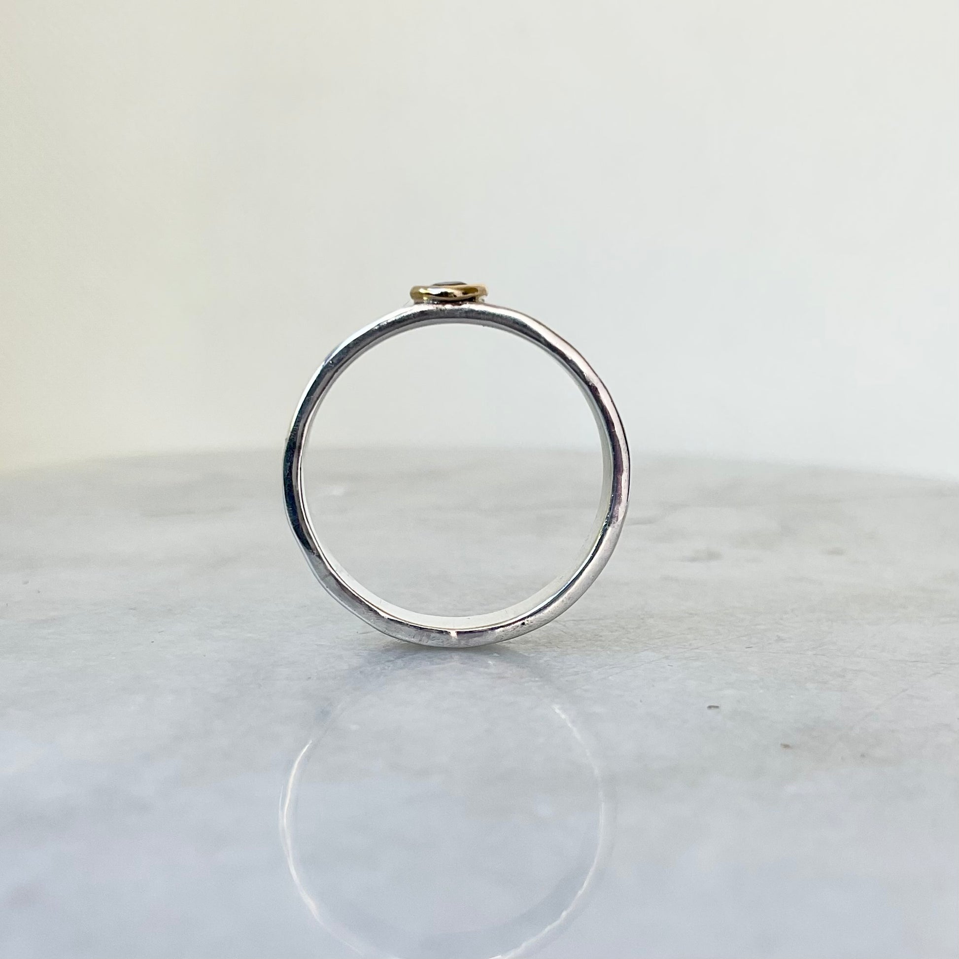 Side view of sterling silver garnet ring