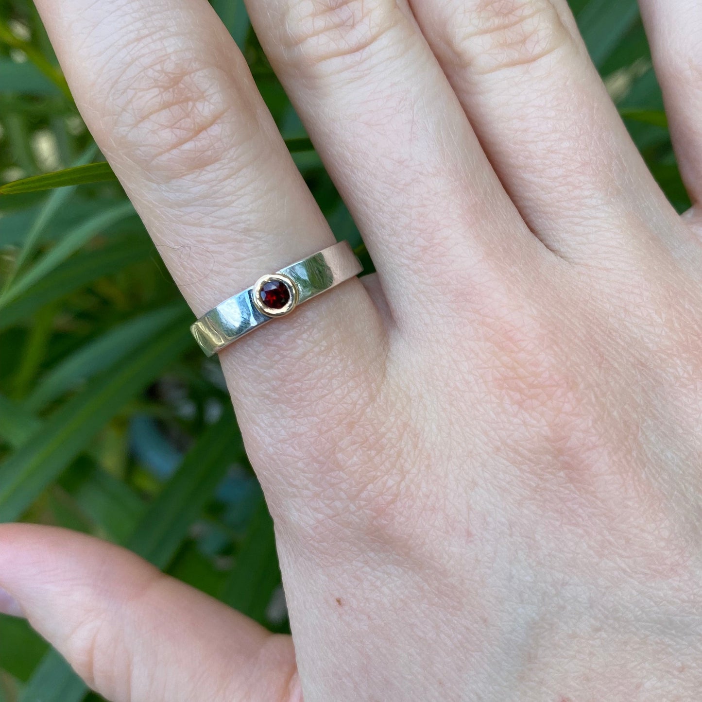 Garnet ring shown on model