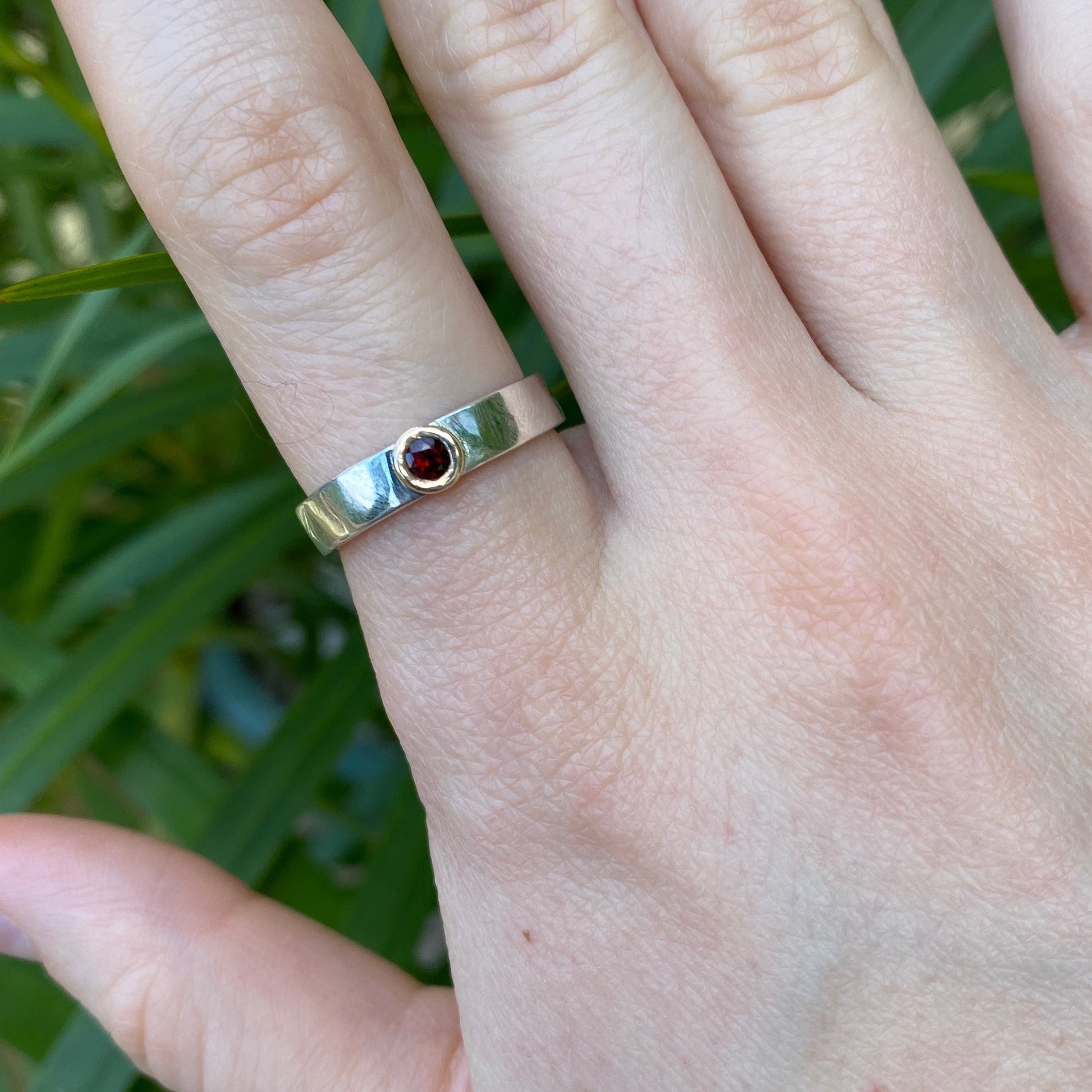 Garnet ring shown on model
