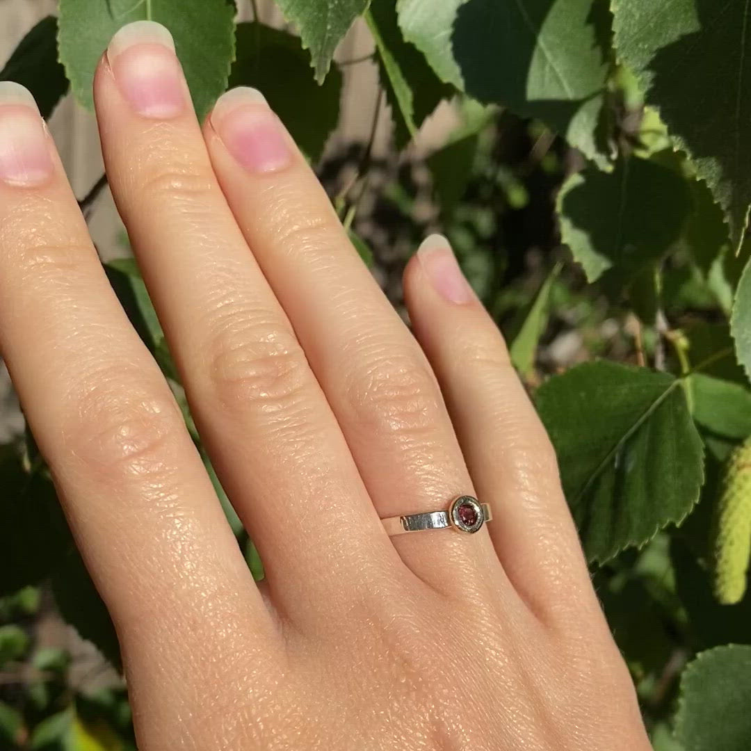 Video showing garnet ring on model