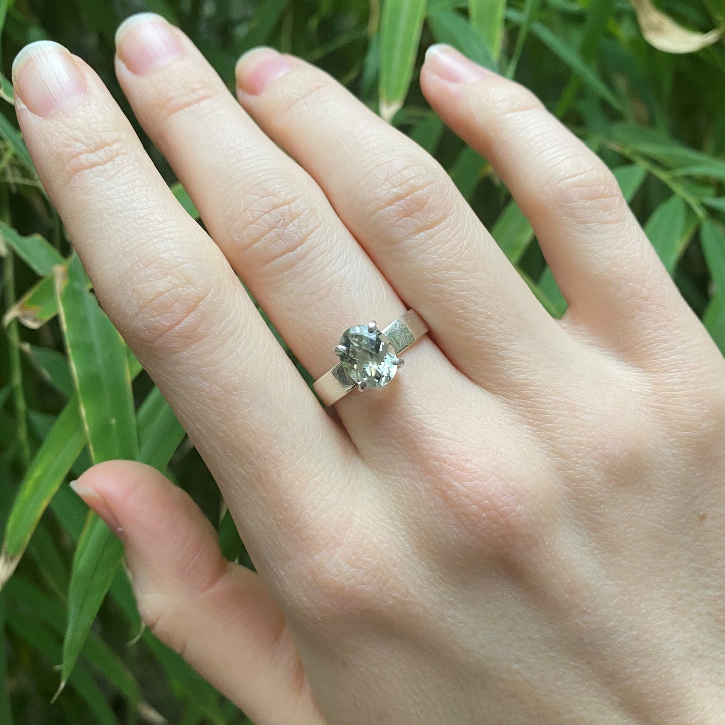 green amethyst ring on model